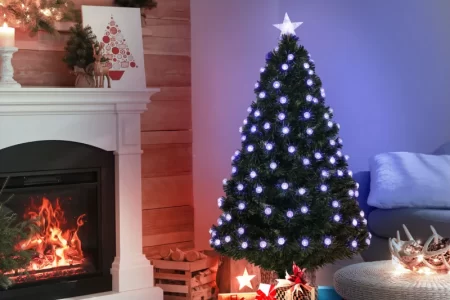 Cozy living room with glowing Christmas tree and gifts