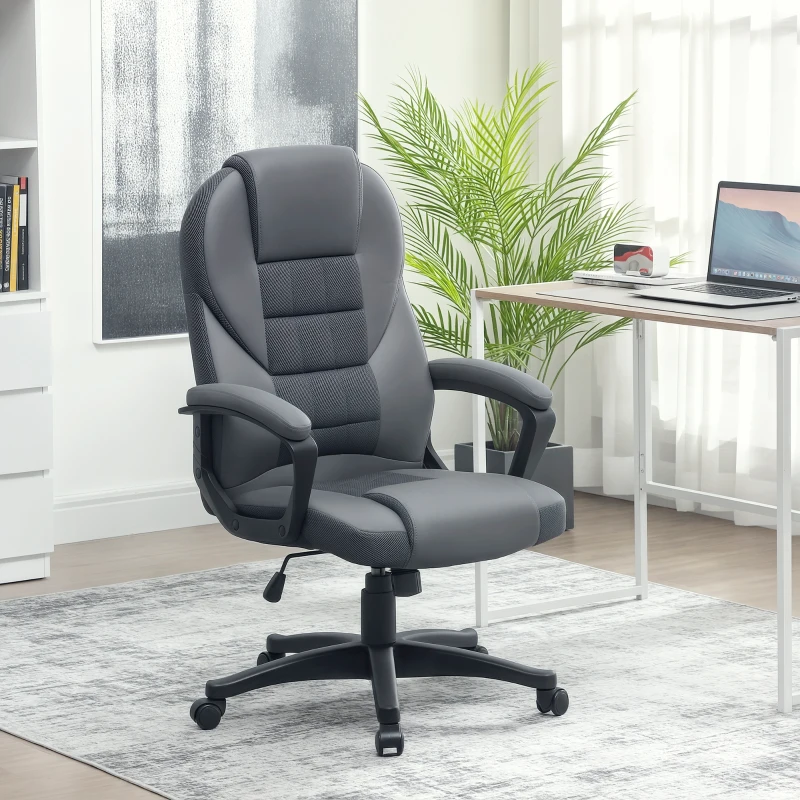 Gray mesh office chair beside desk and laptop