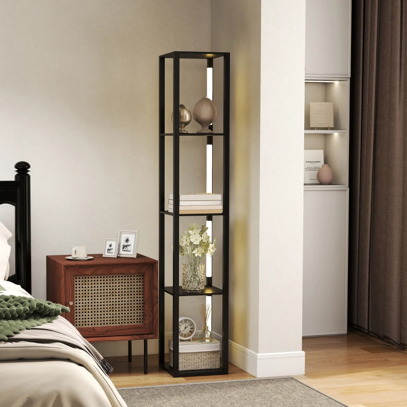 Black shelf floor lamp with illuminated tiers placed beside a wooden nightstand.