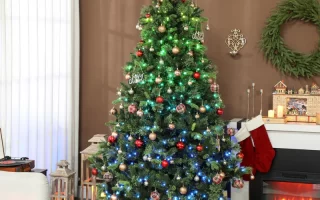 Christmas tree decorated with colorful lights and presents below