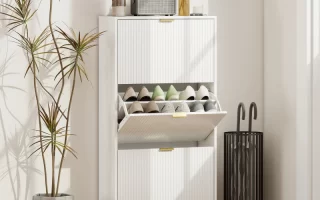 Modern white shoe cabinet with gold accents and organized footwear display.