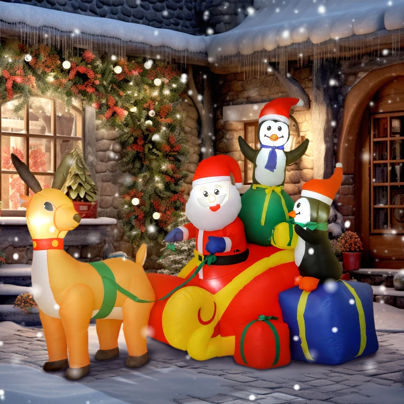 Santa with reindeer and penguins on colorful sleigh display