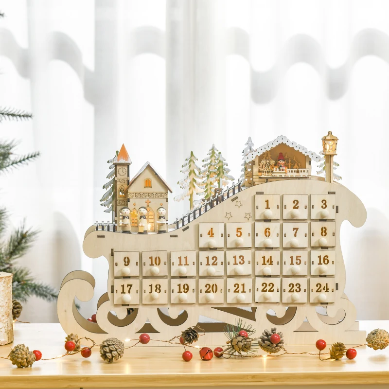 Wooden sleigh advent calendar decorated with village and lights.