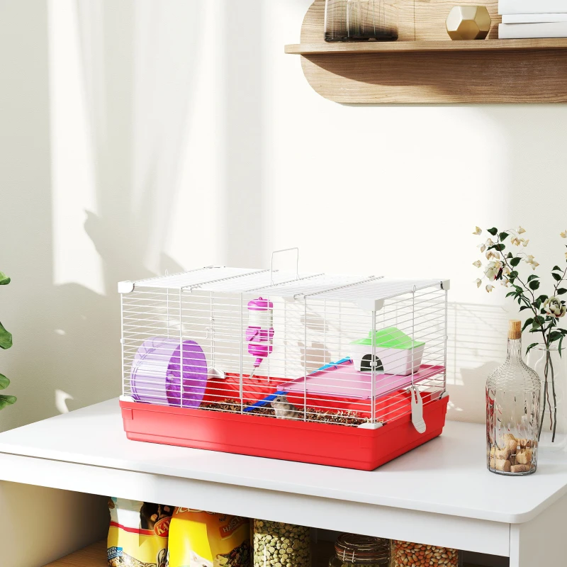 Small portable red and white wire hamster cage with wheel and accessories.

