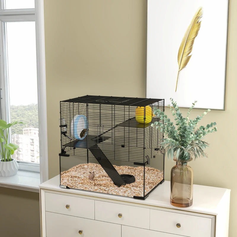 Hamster in glass-bottom wire cage with deep bedding and ramp.

