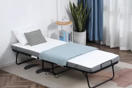 fully assembled foldable bed with mattress in a modern bedroom setting.