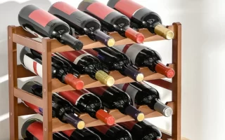 Fully assembled wooden wine rack filled with multiple wine bottles on four storage tiers.