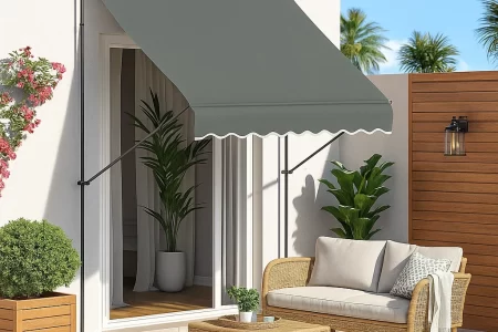 Outdoor freestanding awning shading a patio seating area.